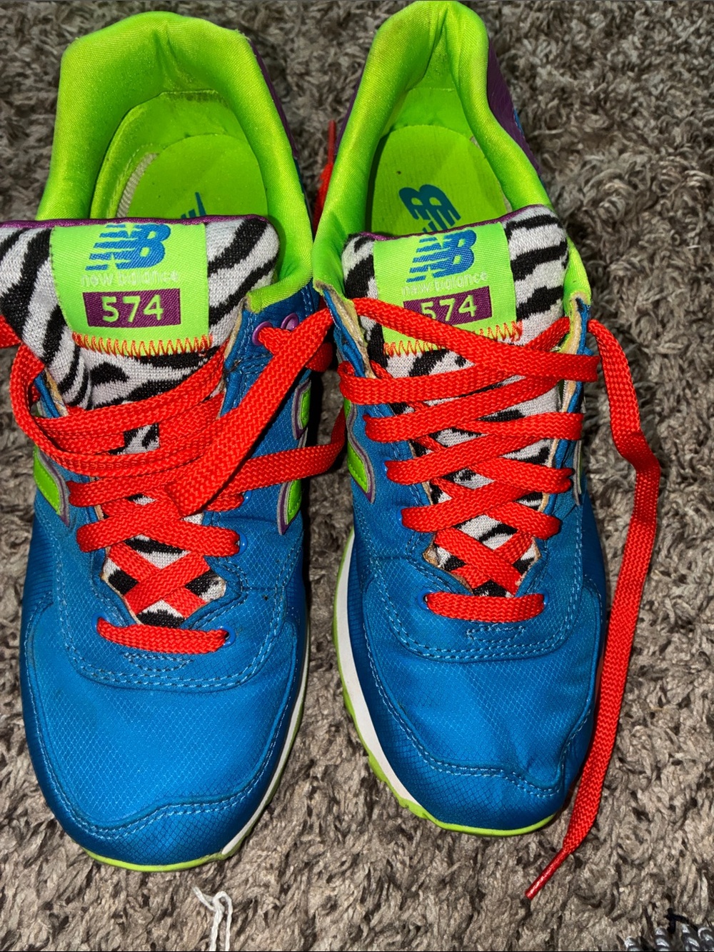 New Balance Women's 574 Sneakers in Bright Blue with Red Laces